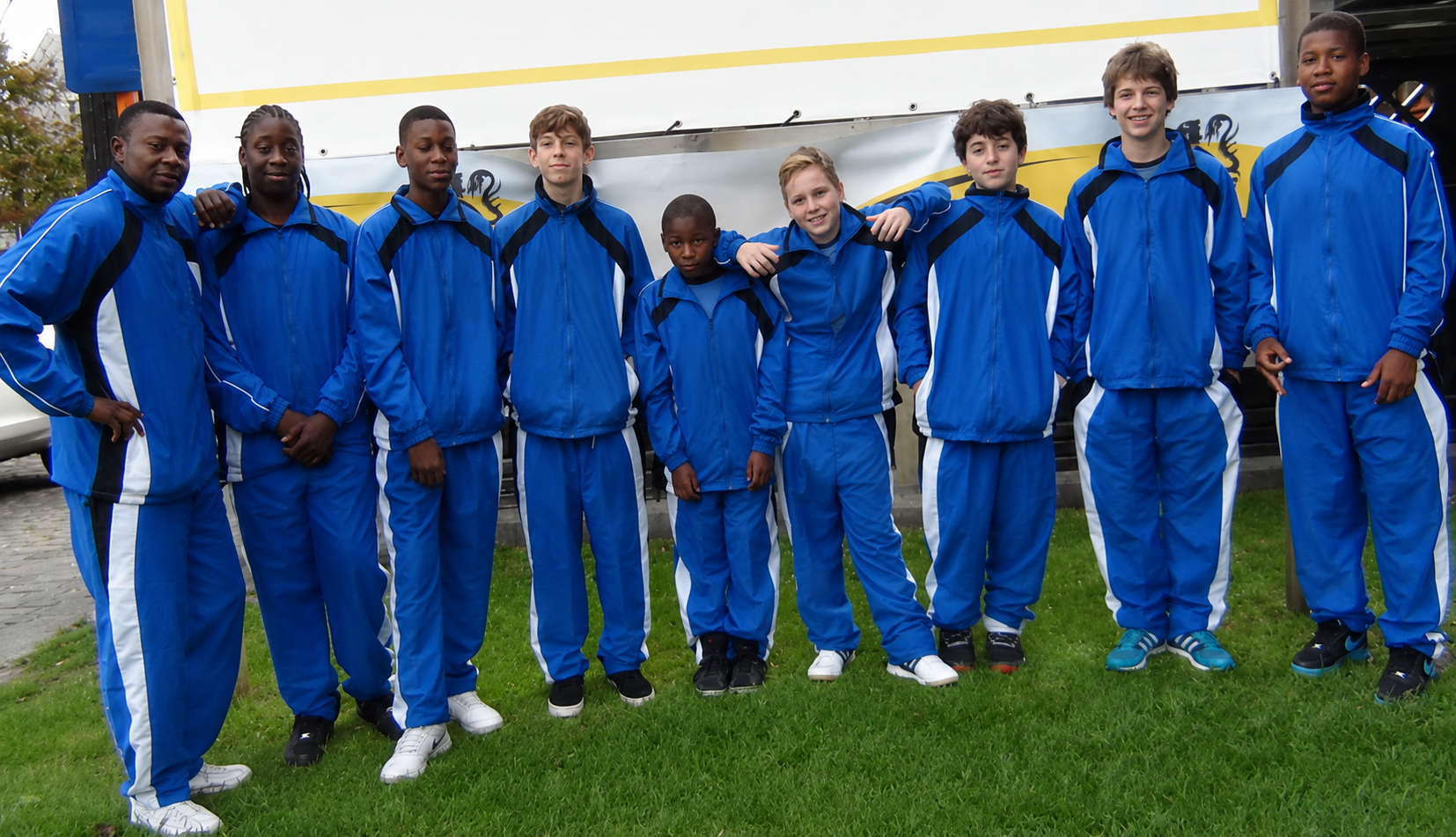 Junior players from Dulwich Table Tennis Club together in club tracksuits